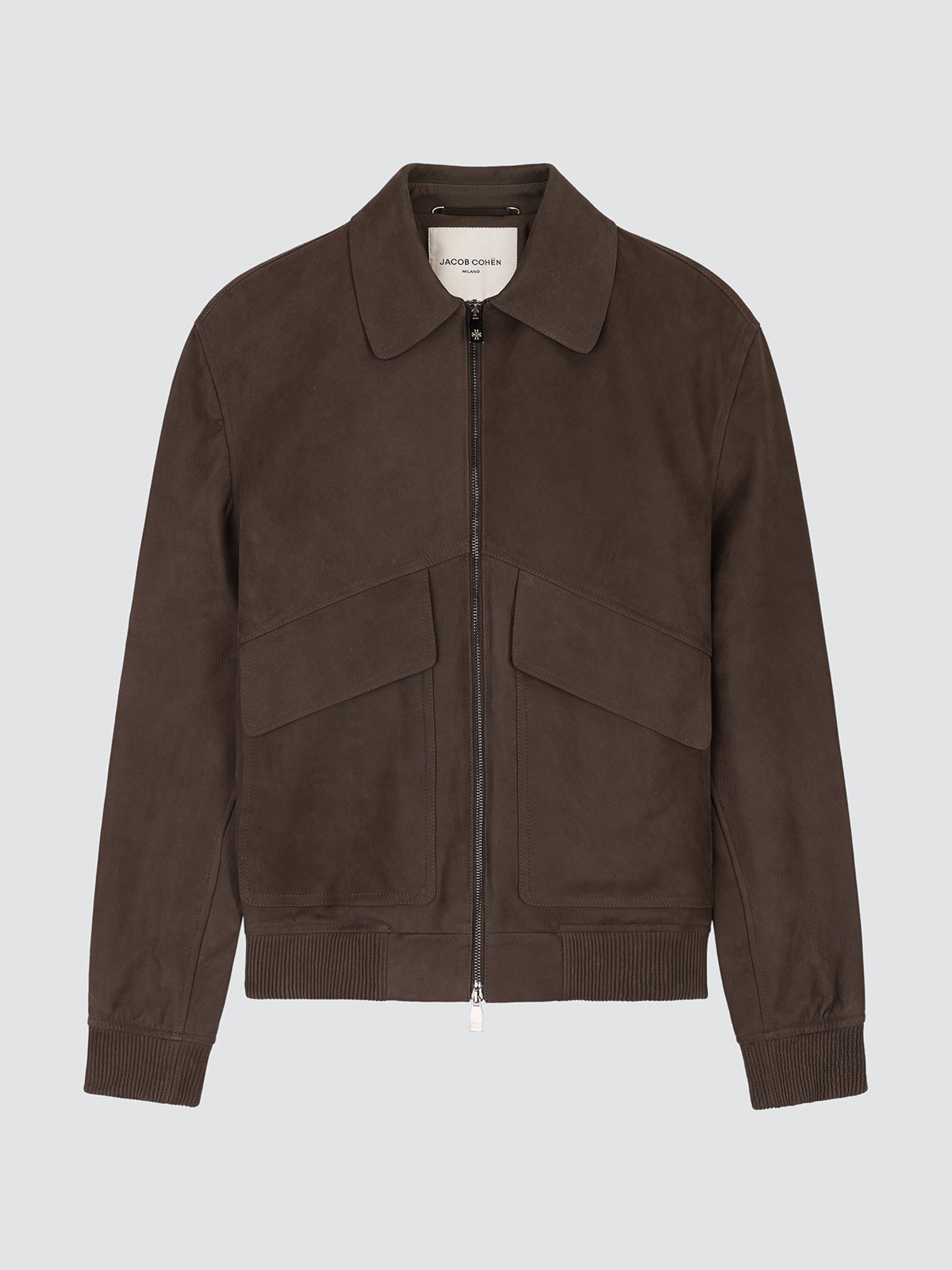 A dark brown suede jacket with a full front zipper, a pointed collar, and two large front flap pockets, shown against a light gray background.