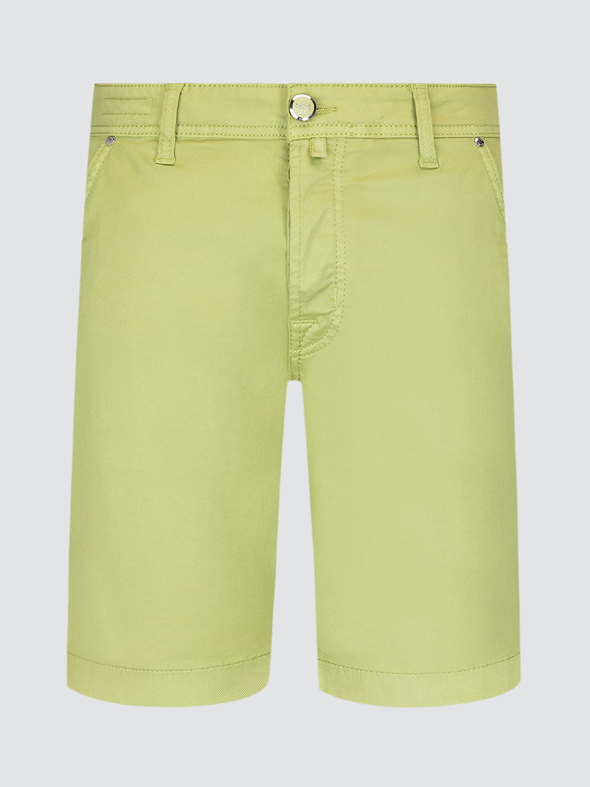 Green shorts Jaob Cohen on a light gray background