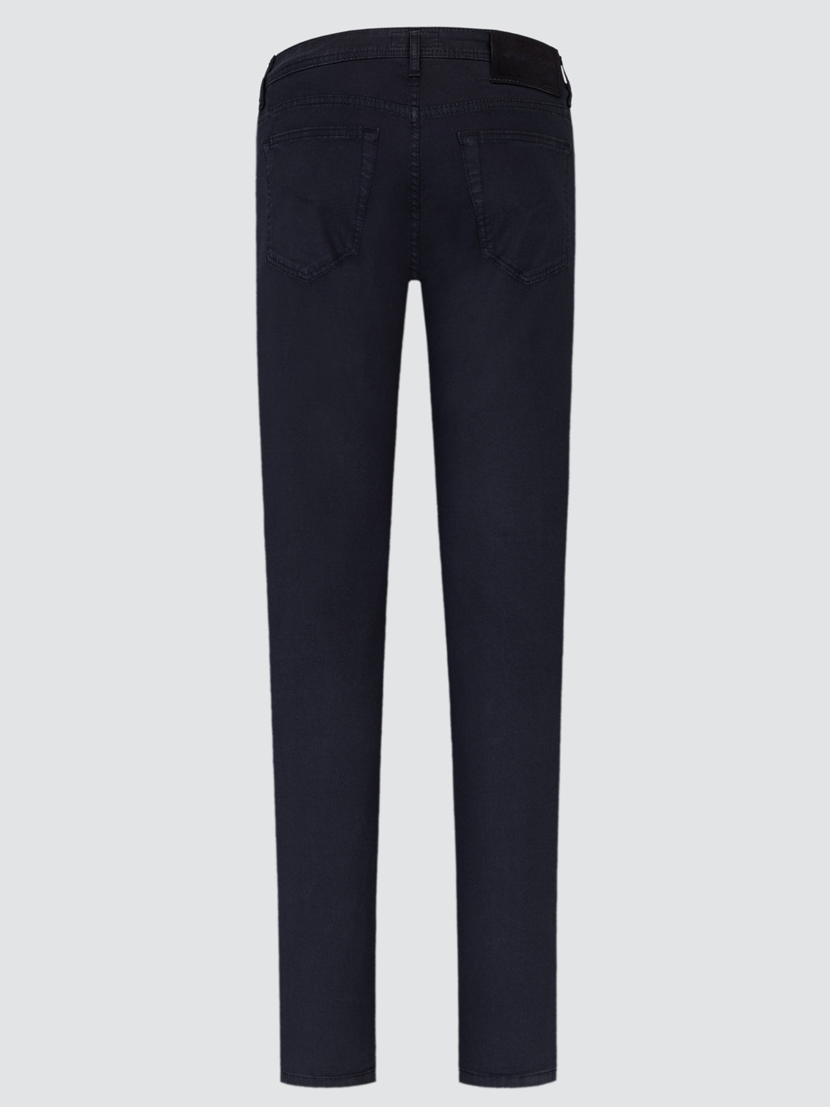Black jeans on a light gray background
