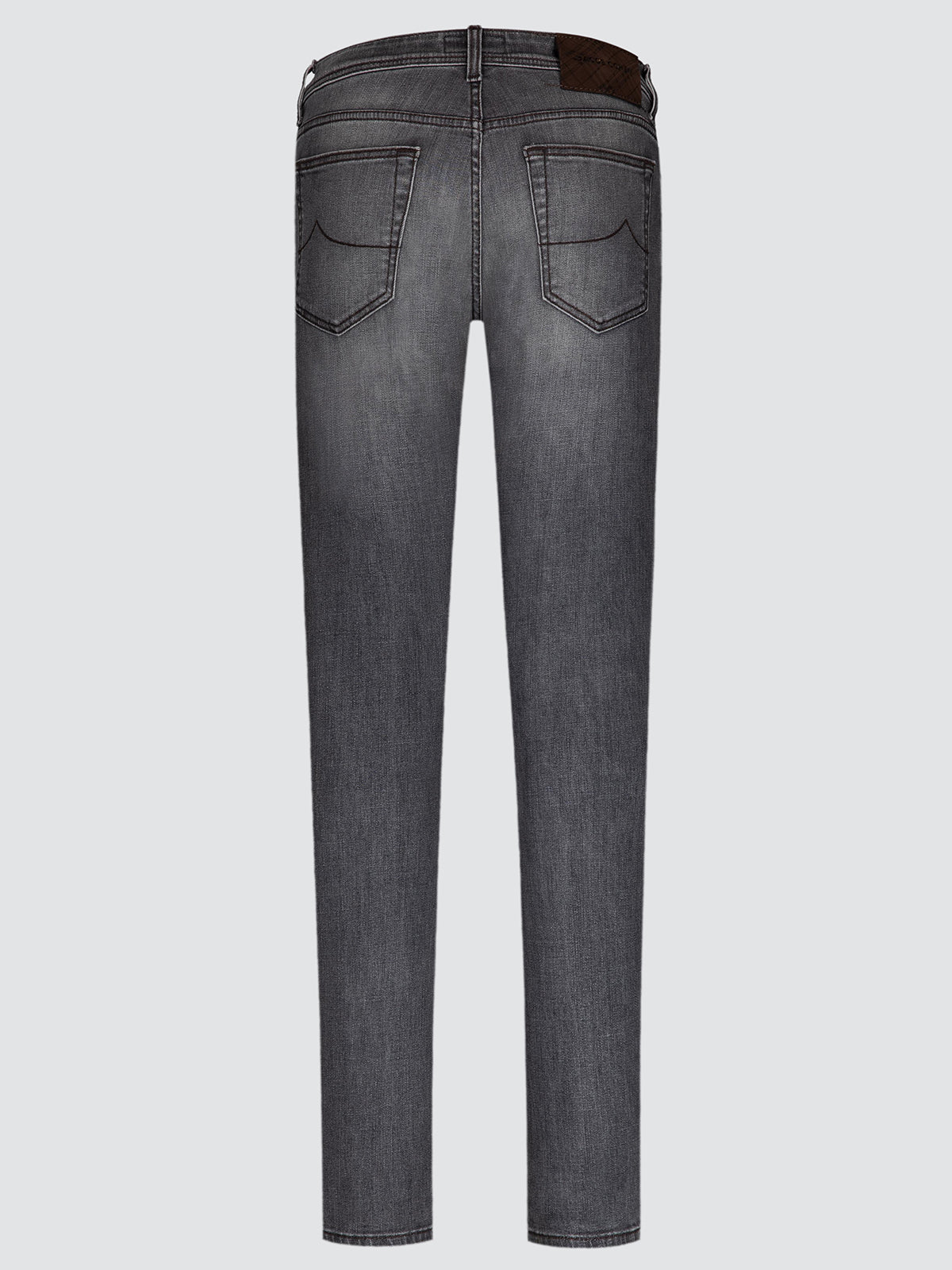 Back view of dark gray washed denim jeans with a brown leather patch on the waistband, shown against a light gray background.