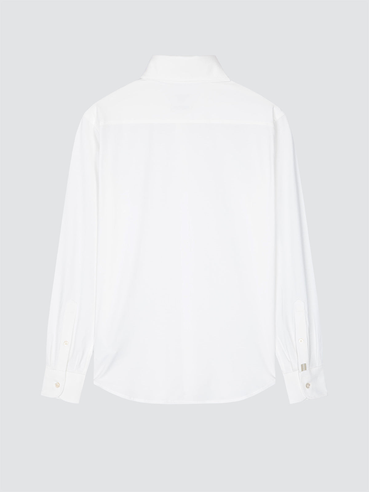 A white long-sleeve button-up shirt shown from the back, featuring a classic collar and button cuffs, displayed on a neutral light gray background.