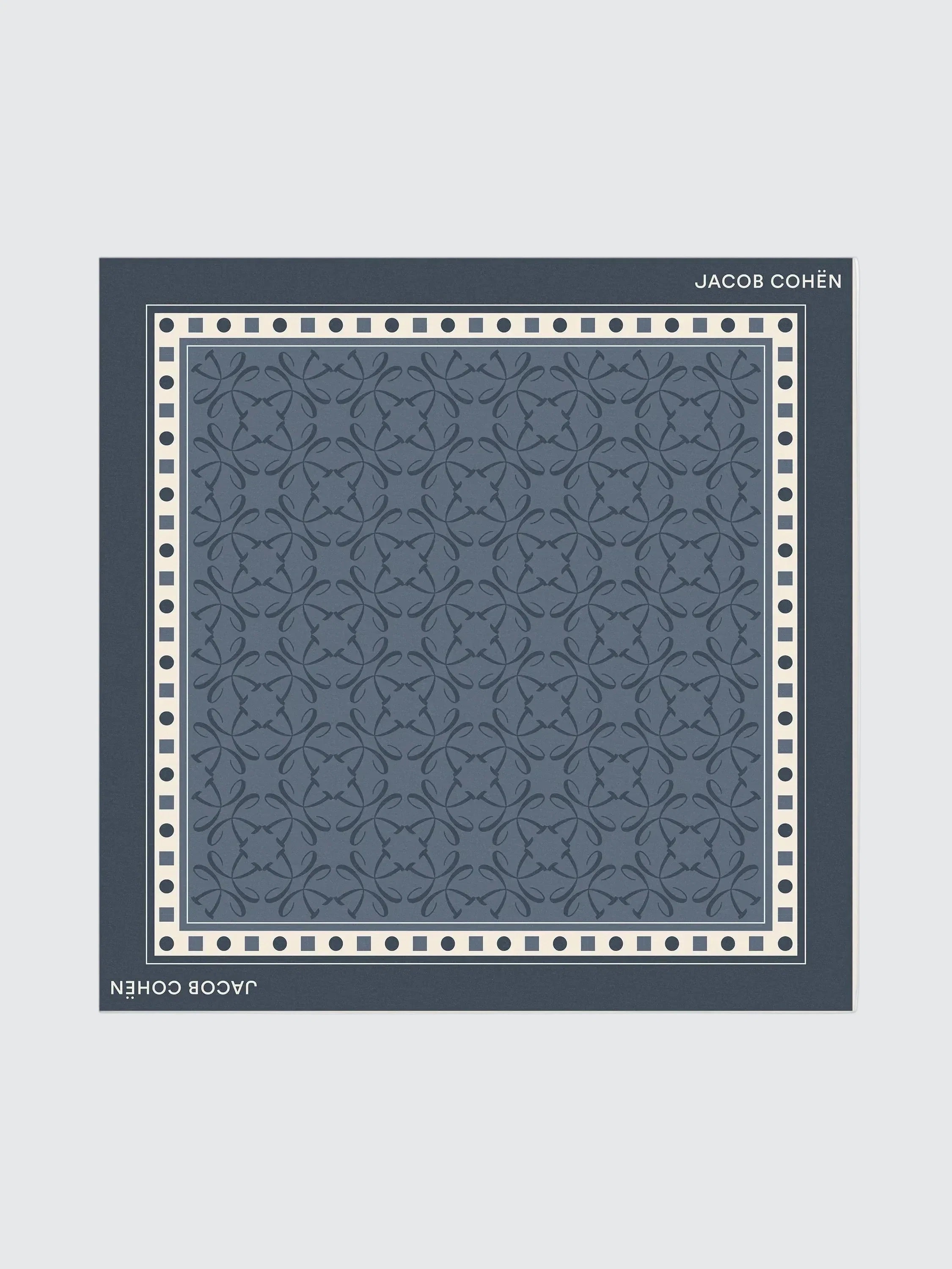 Navy blue patterned fabric square with 'JACOB COHEN' branding on a Gray background