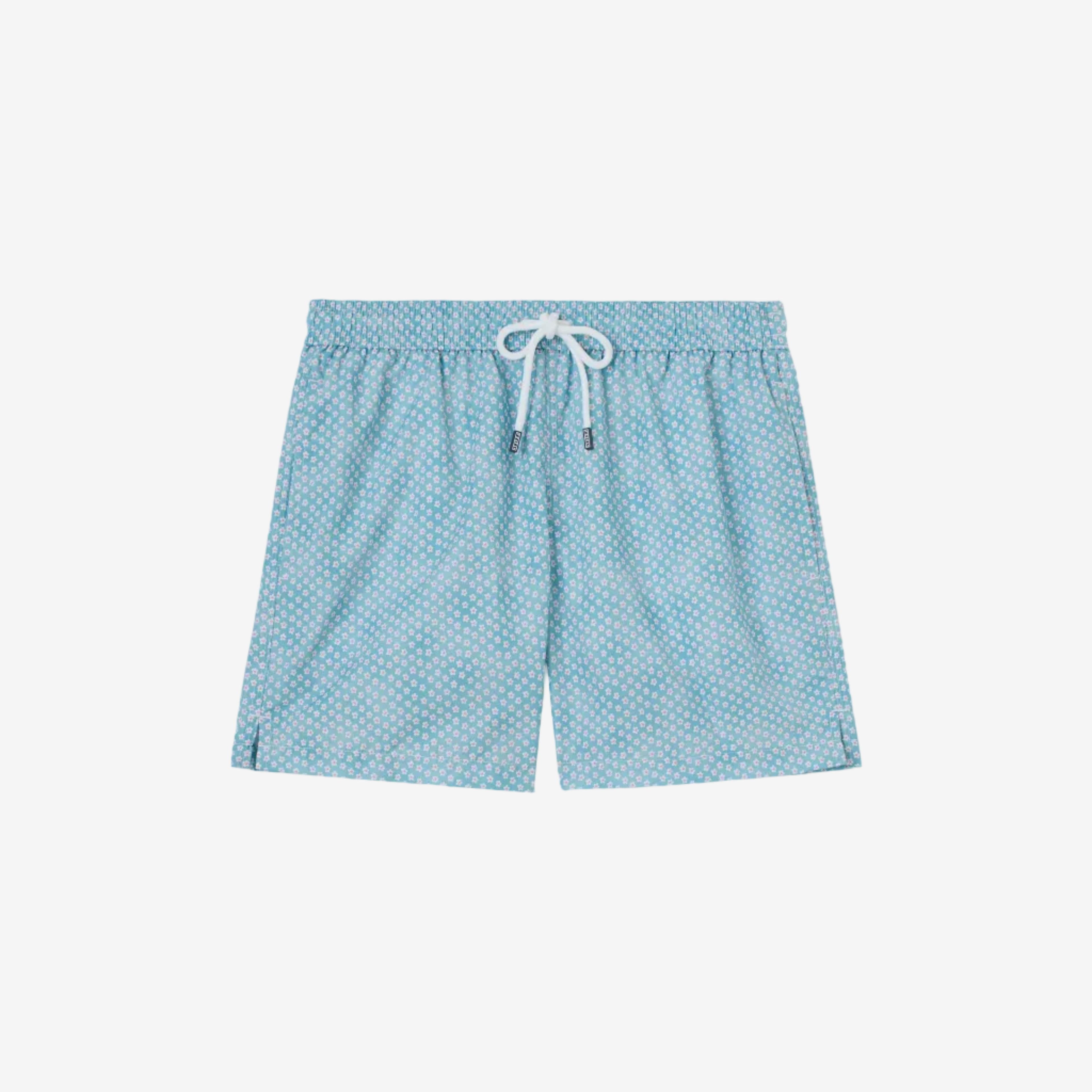 Blue patterned shorts with a white drawstring on a beige background