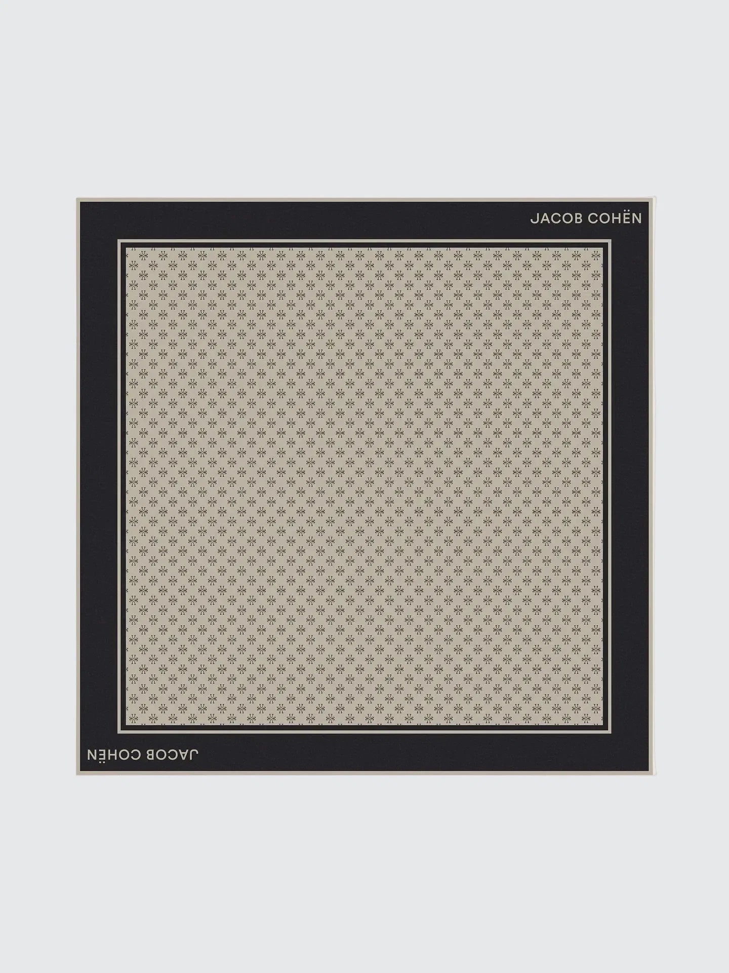 Patterned fabric bandana with 'JACOB COHEN' branding on a grey background
