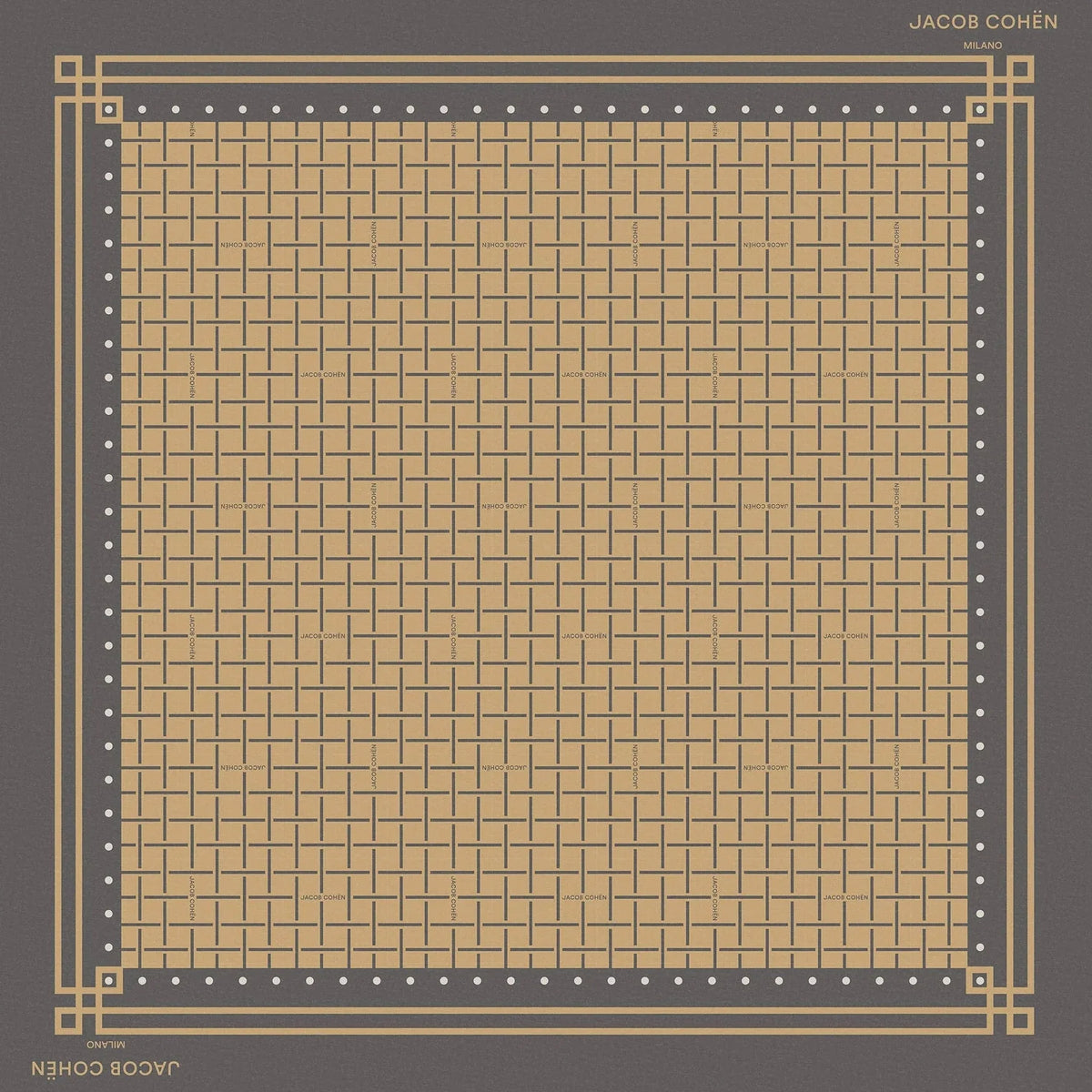 A square scarf laid flat on a light beige background. The scarf has a dark gray border with a fine gold grid pattern and a thicker gold geometric border, with the text 'JACOB COHEN'