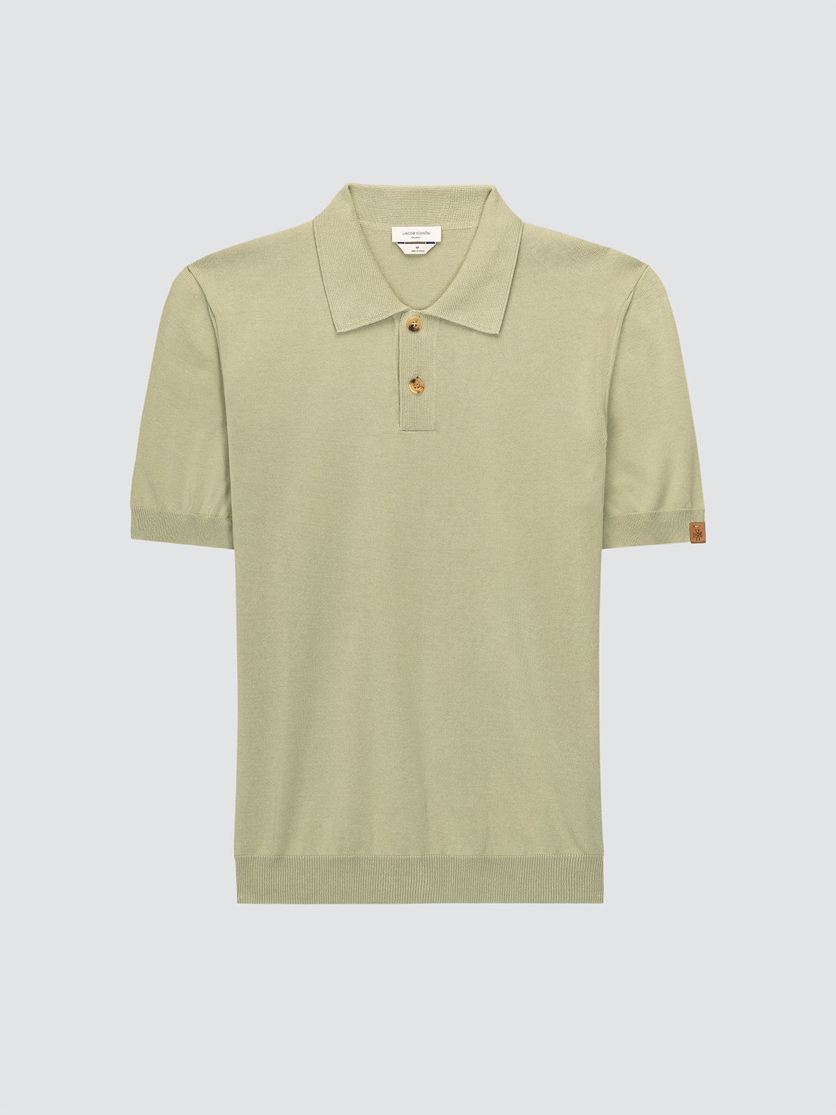 Pastel Green polo shirt Jacob Cohën knitted on a light gray background