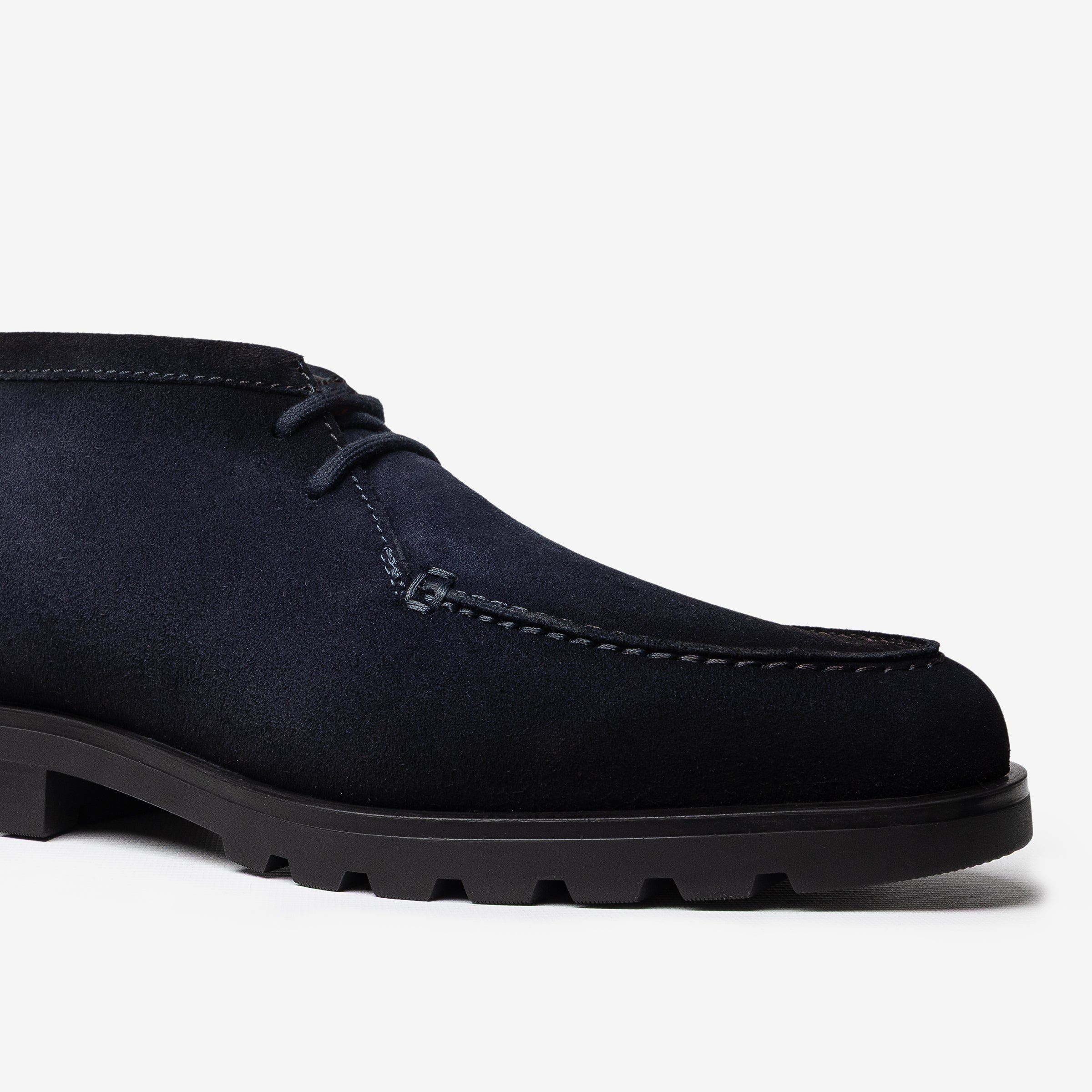 Dark blue lace-up lined desert boots