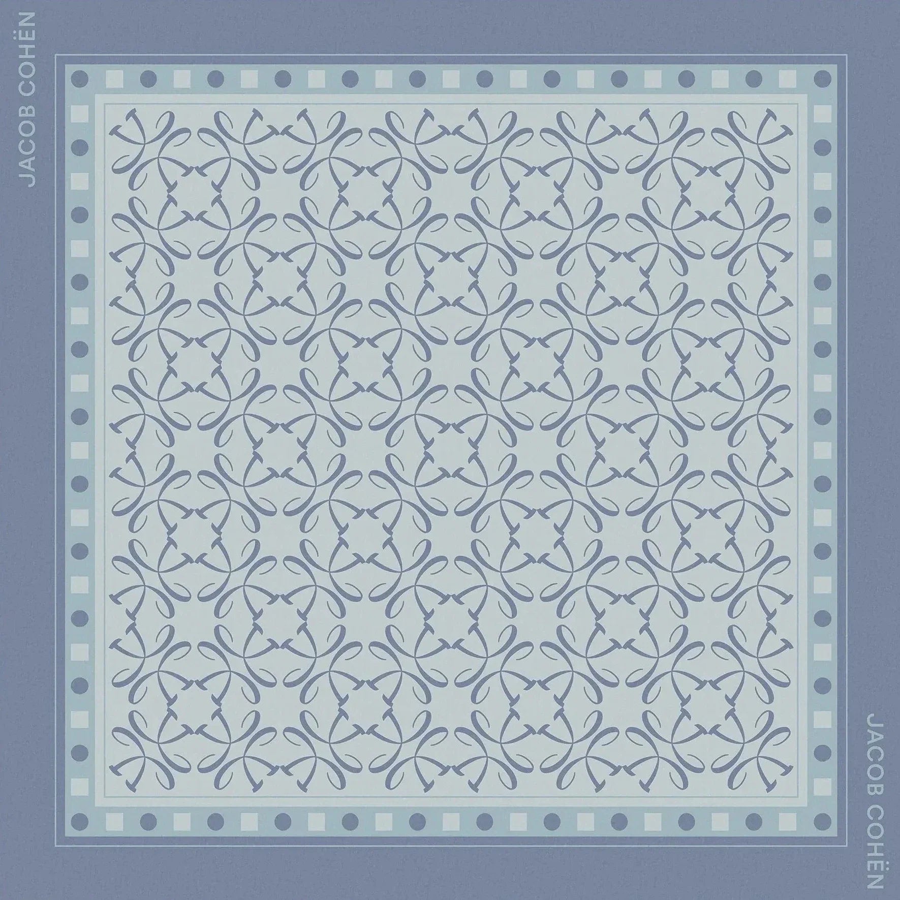 Blue patterned scarf with brand name on a light gray background