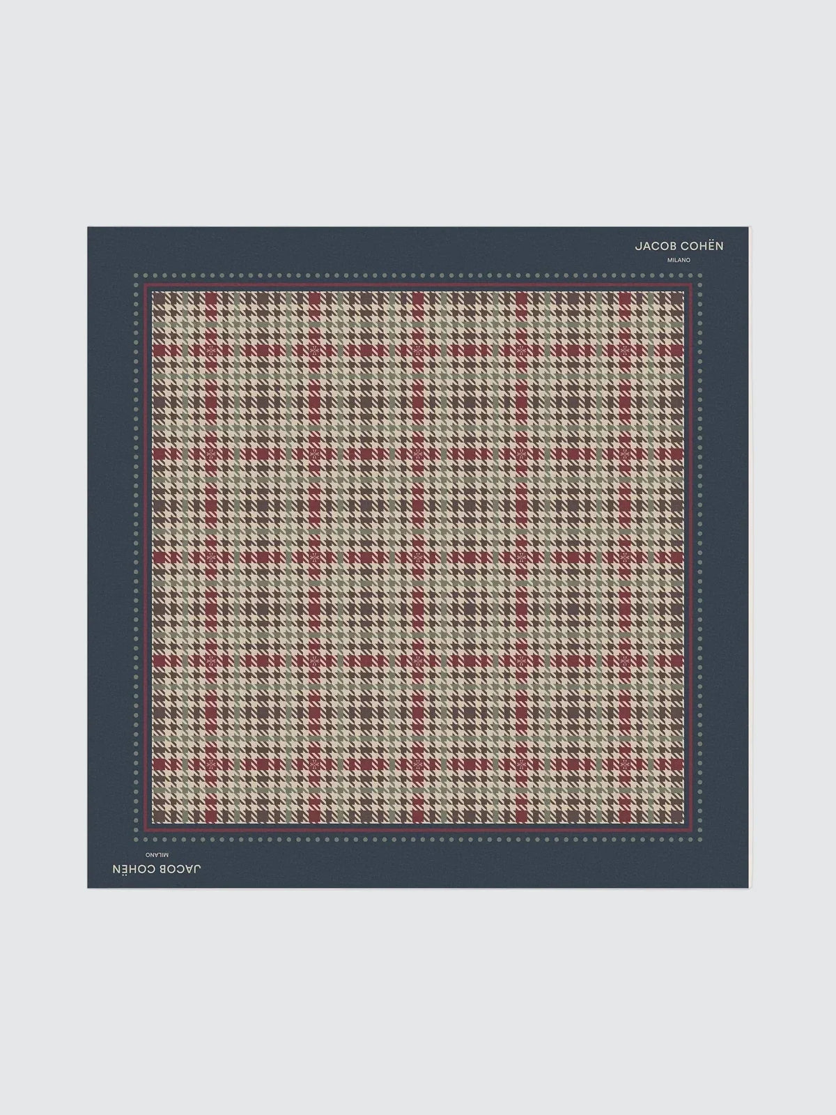 A square scarf or fabric swatch with a houndstooth plaid pattern in beige, red, and gray, bordered by a dark navy blue edge. The brand name 'JACOB COHEN' is printed in white at the top right of the border, and 'JACOB COHEN & CO.