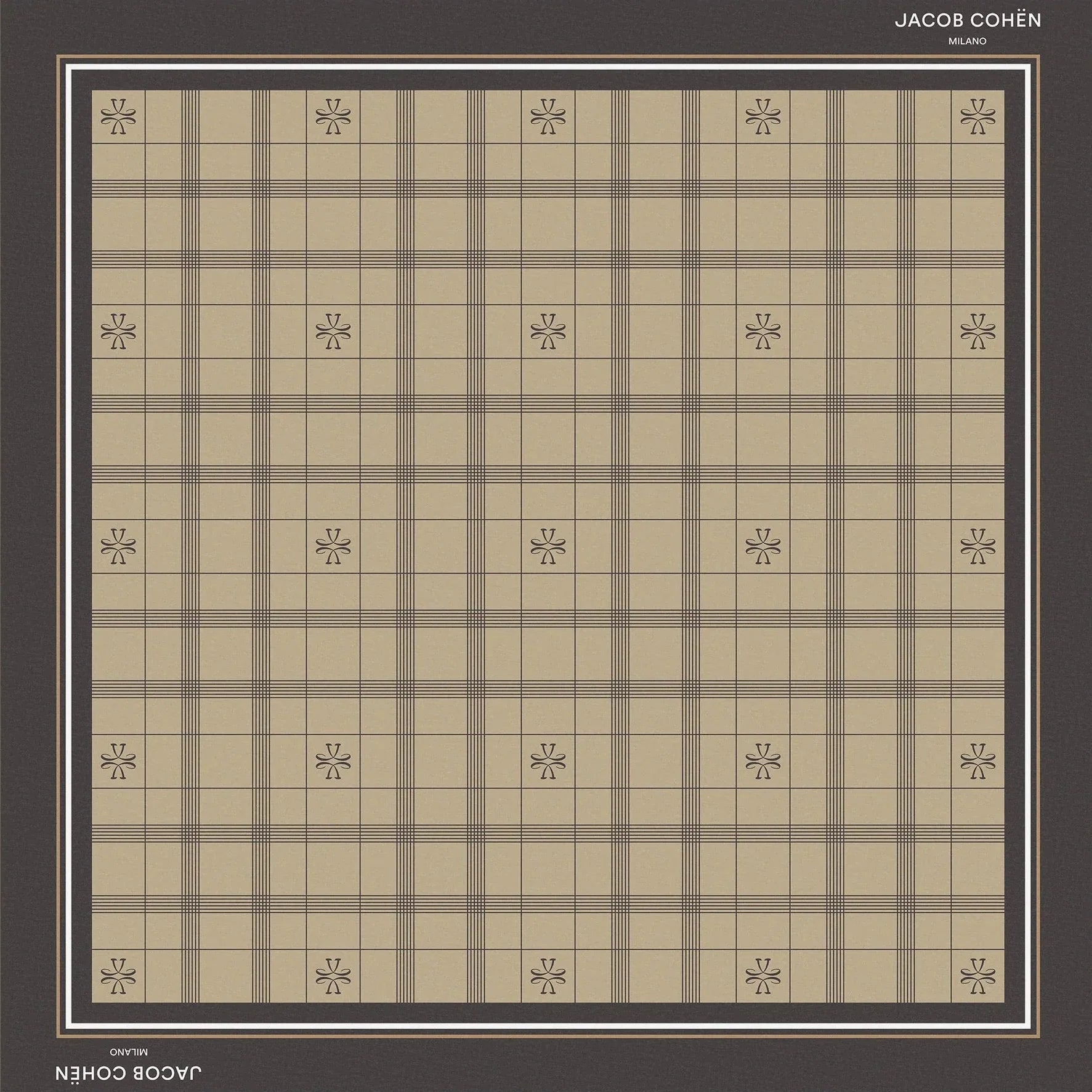 A square scarf featuring a beige and brown plaid pattern with small floral motifs at the intersections, framed by a dark gray border with 'JACOB COHEN' printed at the top and bottom.