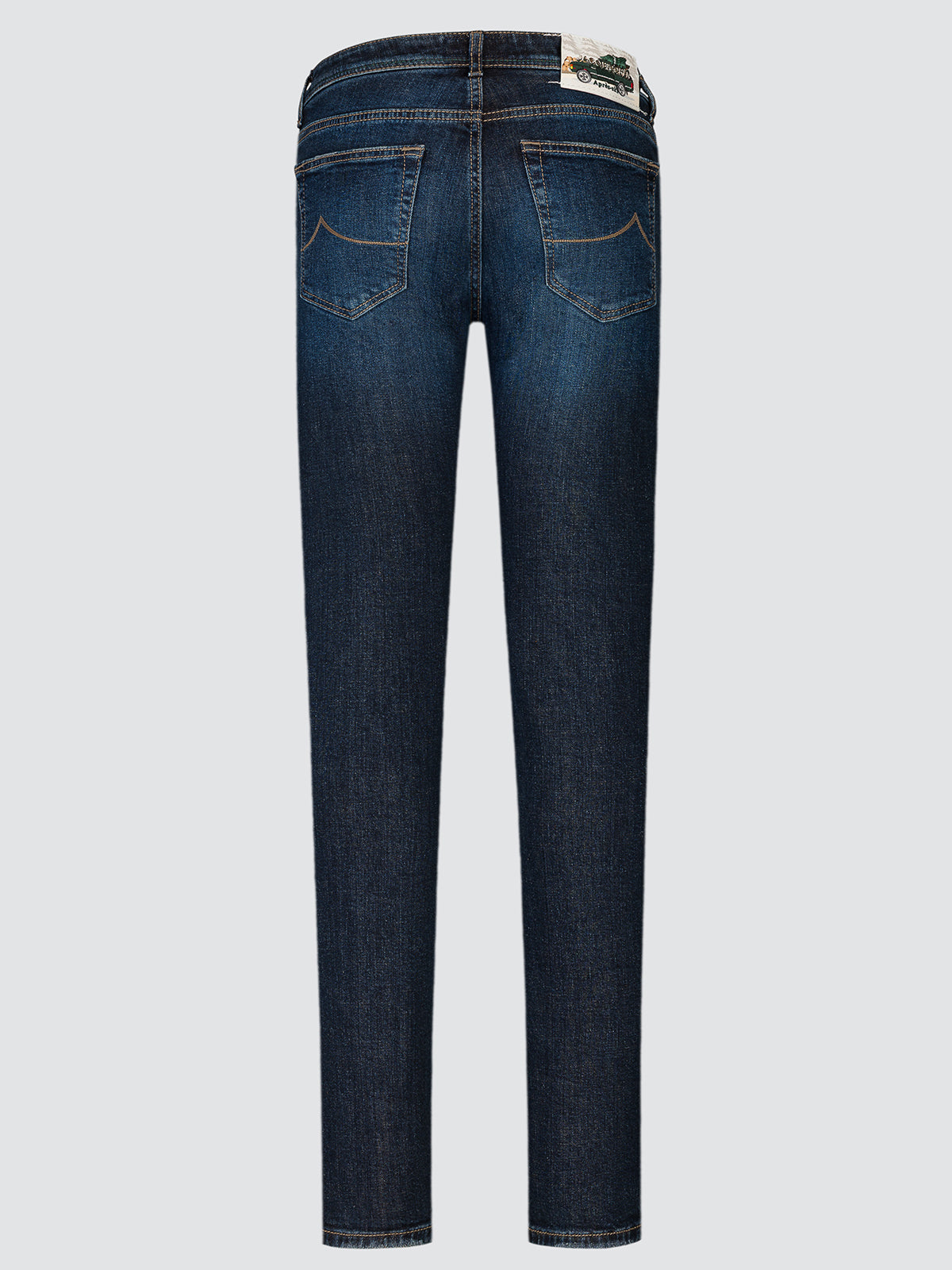 Full-length back view of blue Nick slim jeans laid flat, showing the back pockets and the waistband patch.