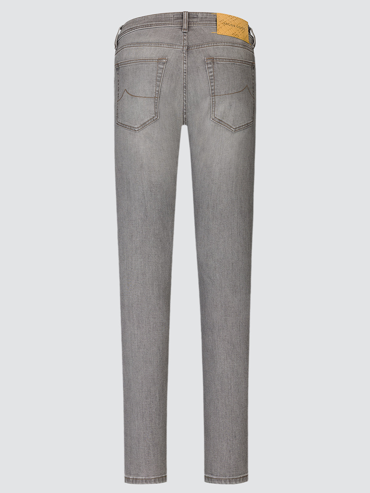 Back view of the light grey Nick Slim jeans showing the mustard-yellow back patch