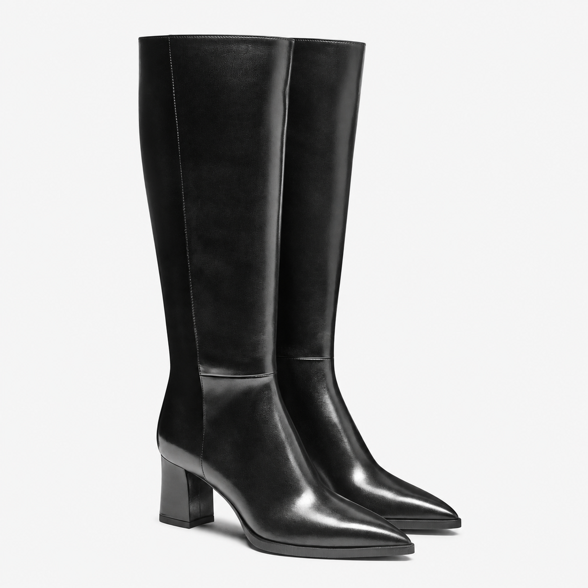 Boots Cuir noir bout pointu semelle gomme