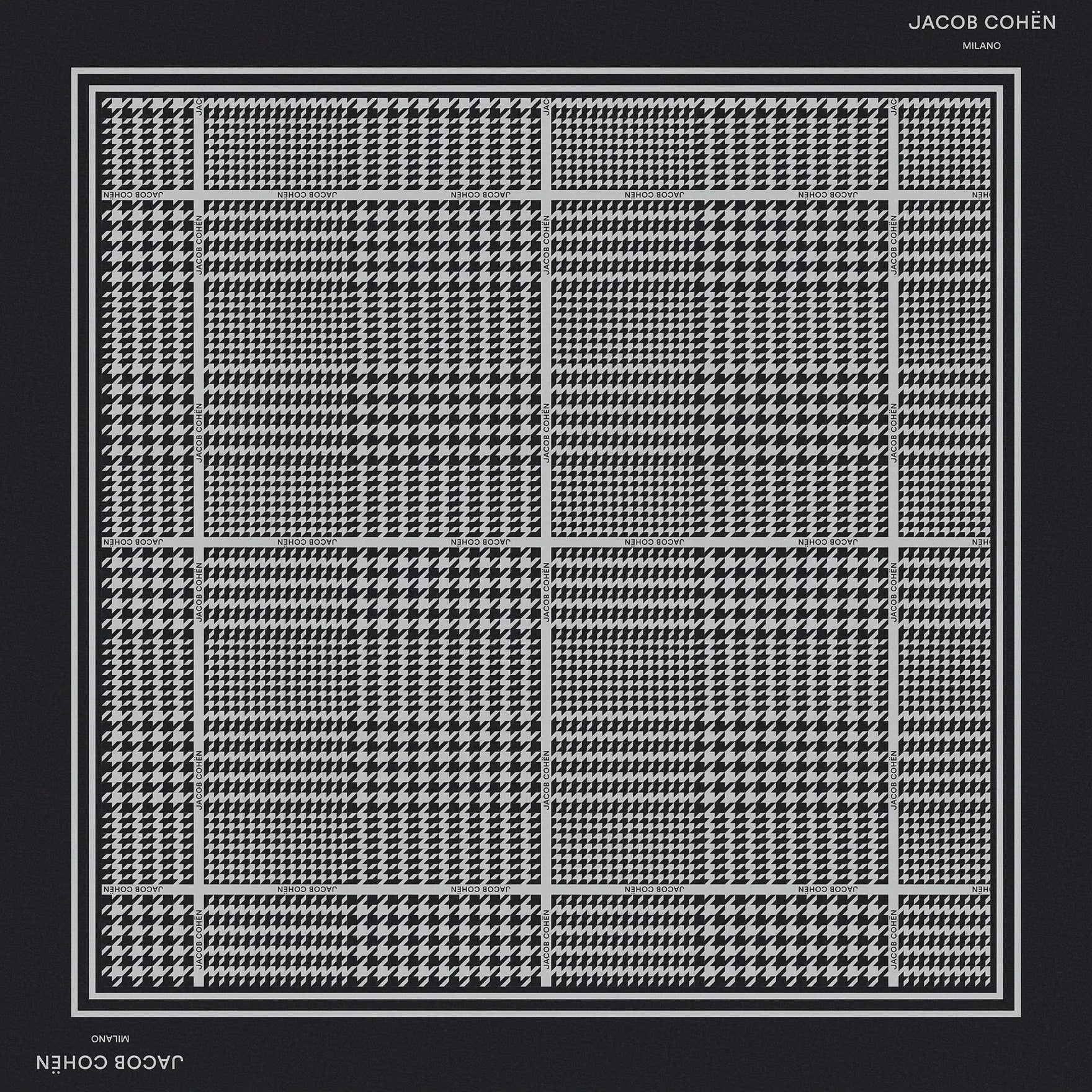 A square scarf by Jacob Cohen, featuring a black and white geometric grid and houndstooth pattern, presented flat against a light beige background.