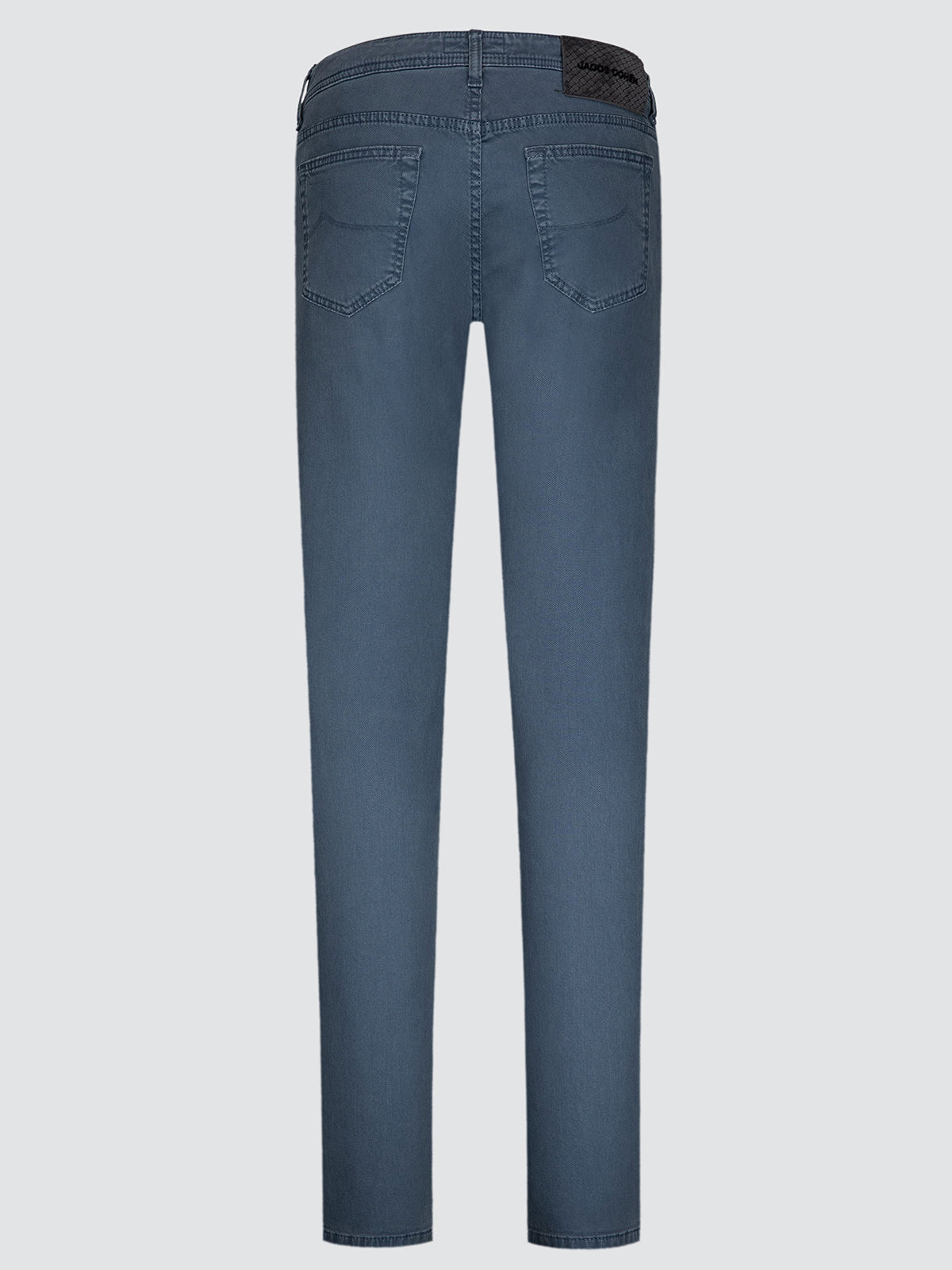 Back view of a pair of medium-wash blue denim jeans on a light gray background.