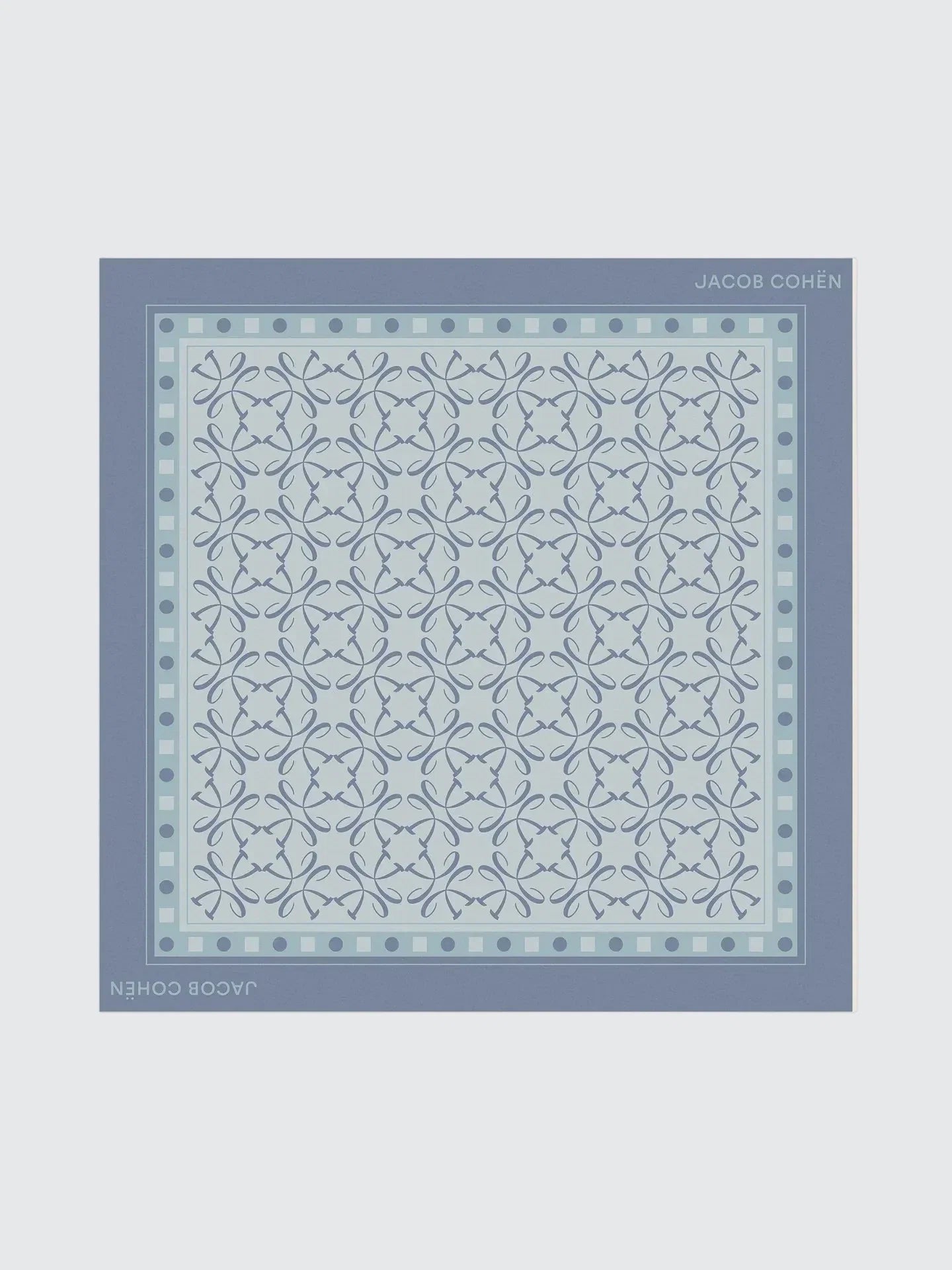 Blue patterned bandana with 'Jacquard' branding on a light grey background