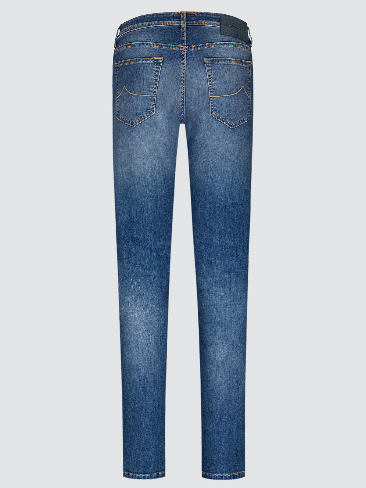 Blue denim jeans shown from the back, featuring a classic five-pocket design and a subtle fading wash, set against a solid light gray background.