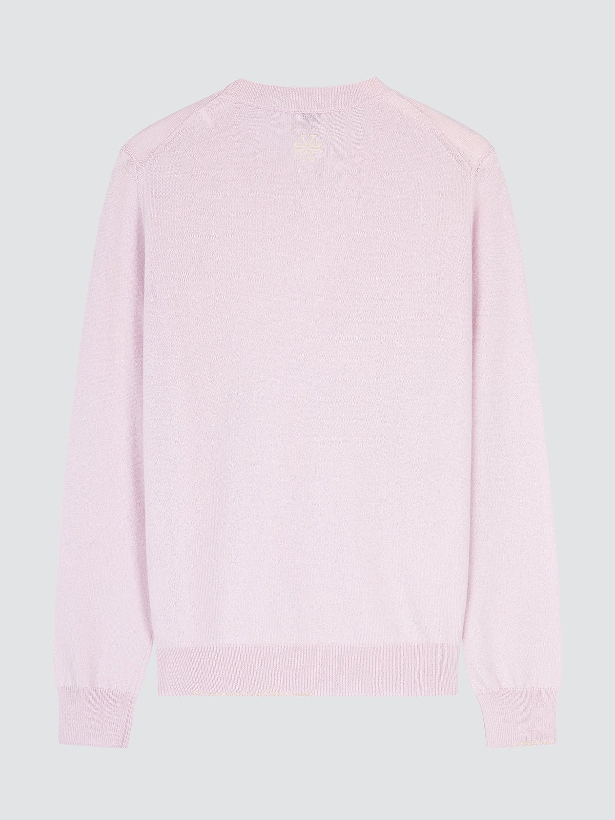 Pink sweater on a light gray background