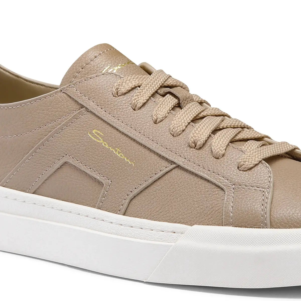 Beige getrommelde leren sneakers dubbele gesp